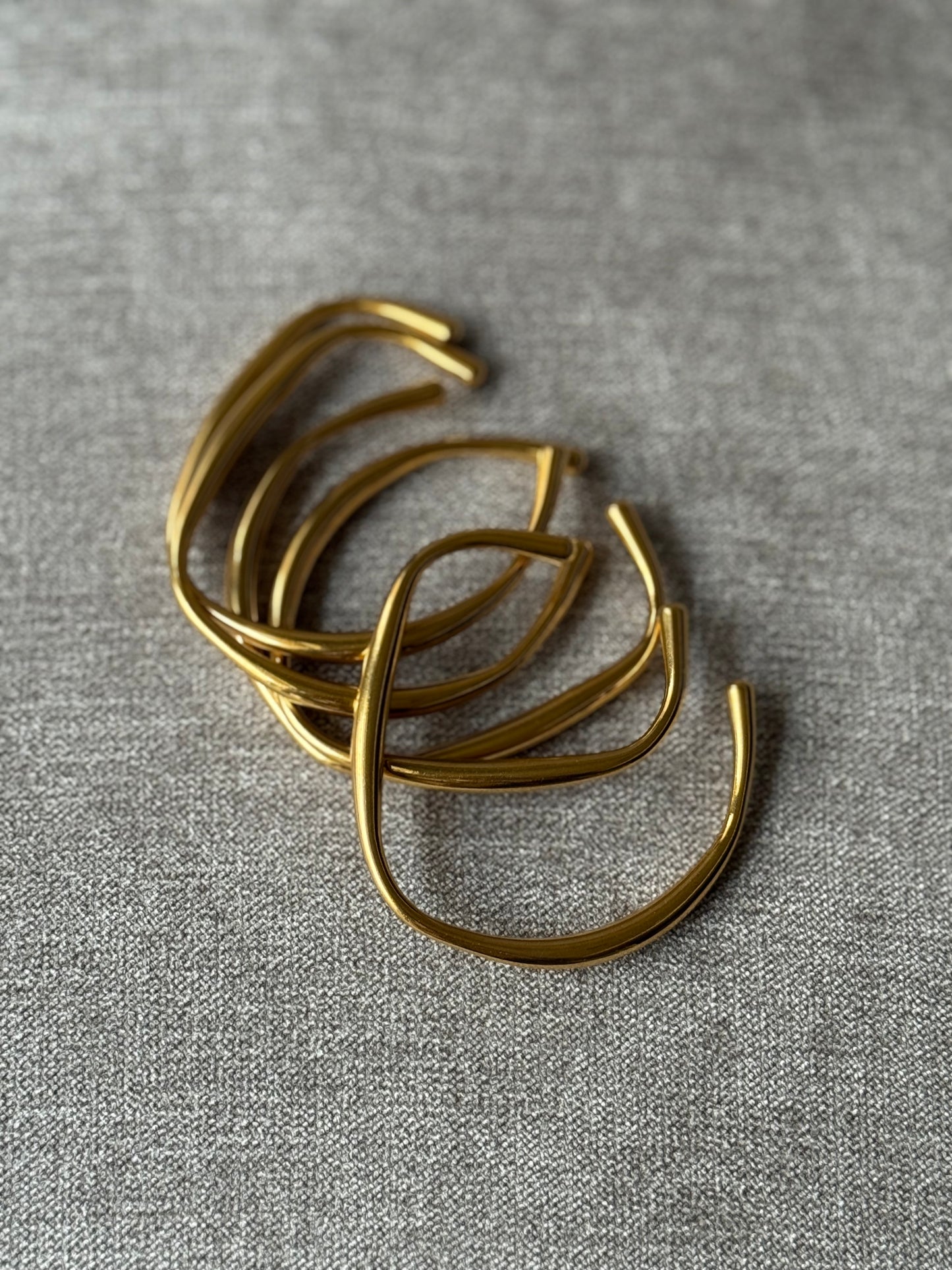 Asymmetric Gold Bracelets
