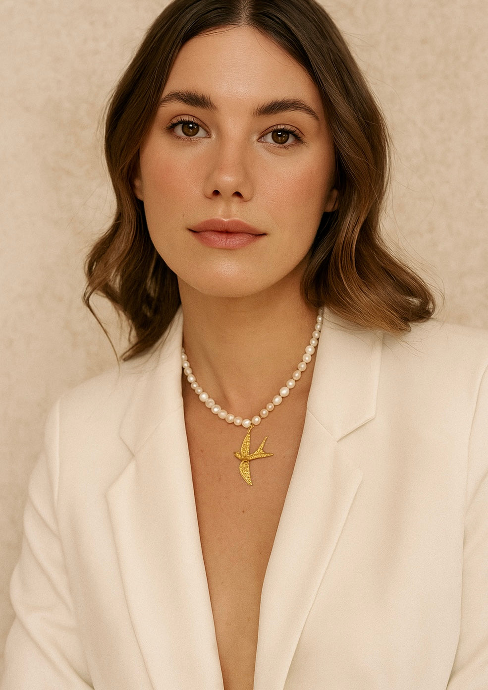 Pearl Necklace with Bird Design Pendant