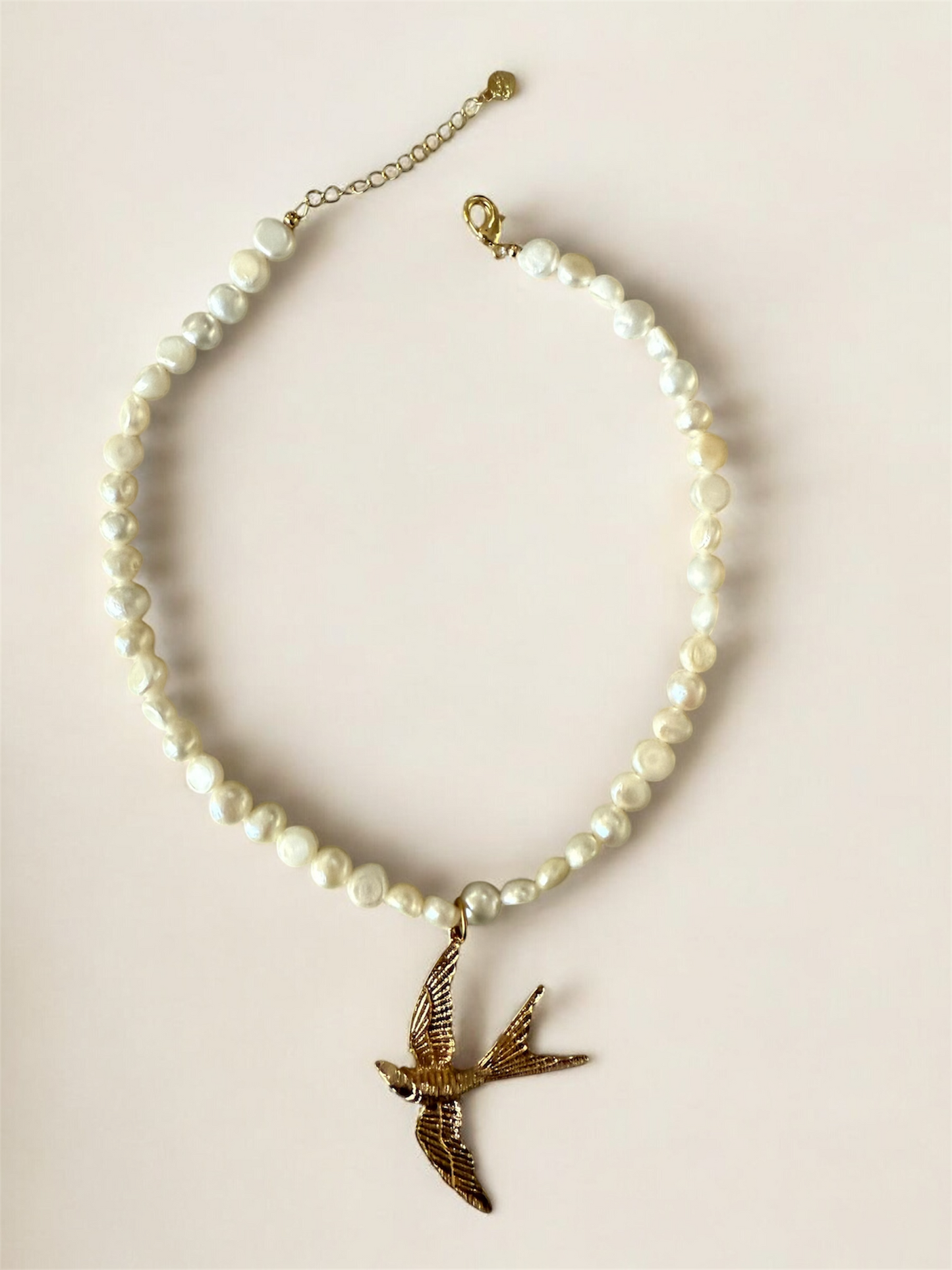 Pearl Necklace with Bird Design Pendant